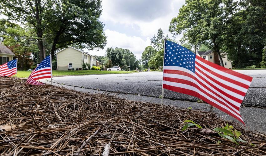 American flags are set out in the neighborhood to celebrate Independence Day.